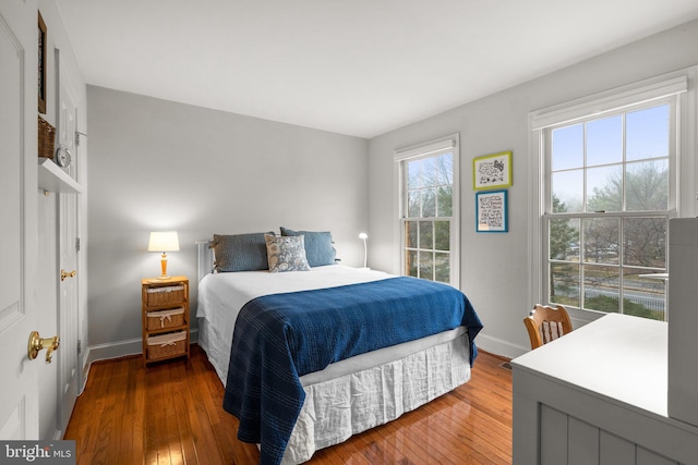 bedroom featuring dark hardwood / wood-style flooring