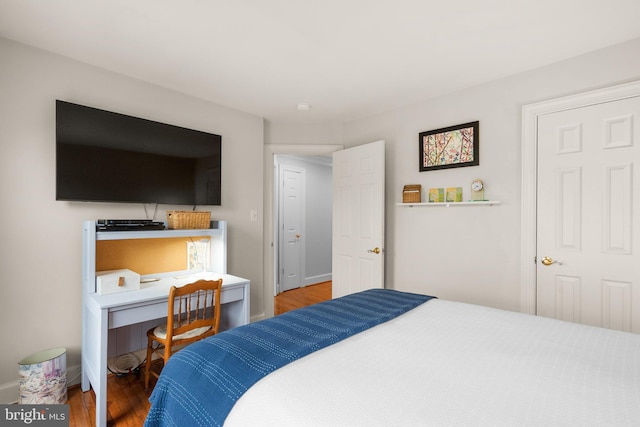 bedroom featuring hardwood / wood-style flooring