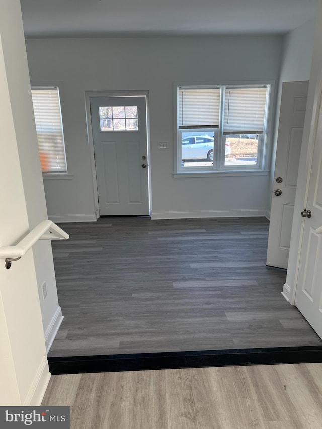 445 Magnolia St, Beverly, NJ 08010 - foyer entrance with wood finished floors and baseboards