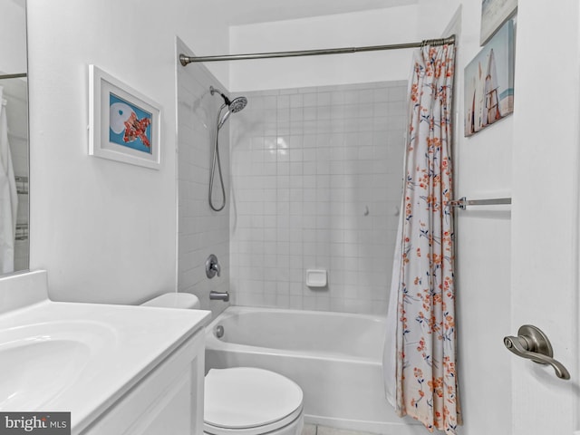 full bathroom with vanity, shower / bathtub combination with curtain, and toilet