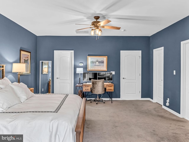 carpeted bedroom with ceiling fan