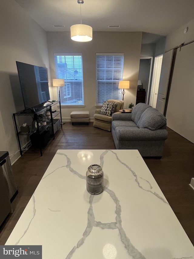 living room with dark wood-type flooring