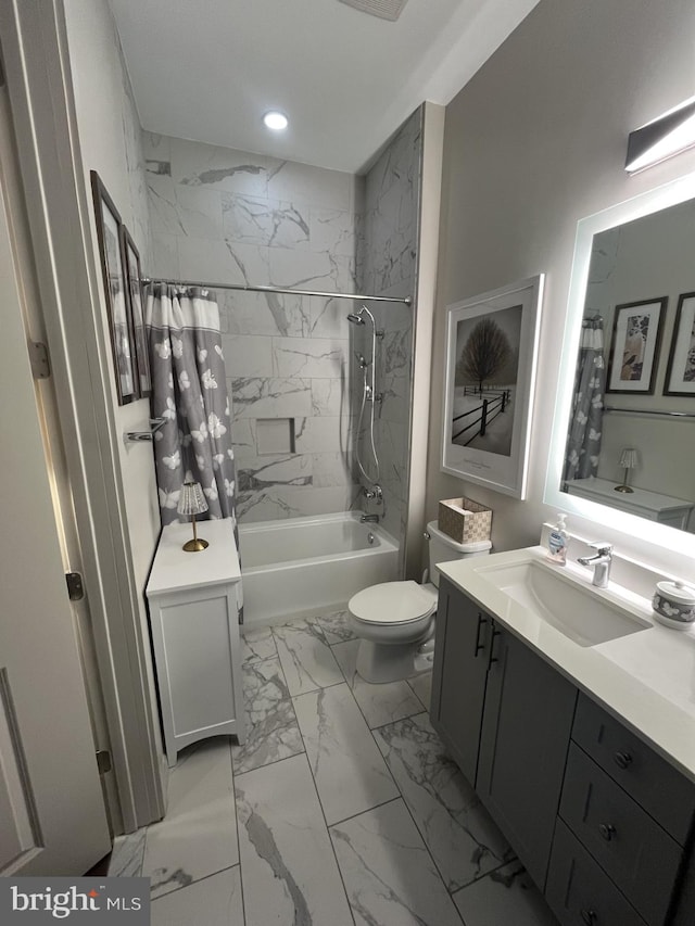 full bathroom with vanity, toilet, and shower / tub combo with curtain