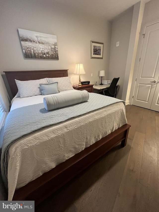 bedroom featuring hardwood / wood-style floors