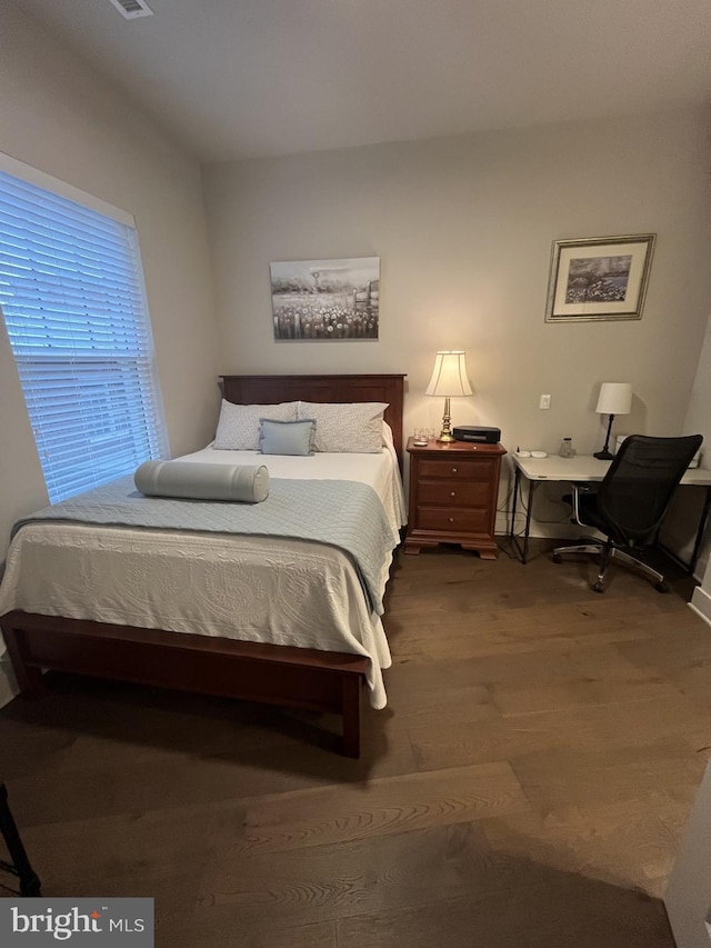 bedroom featuring hardwood / wood-style flooring