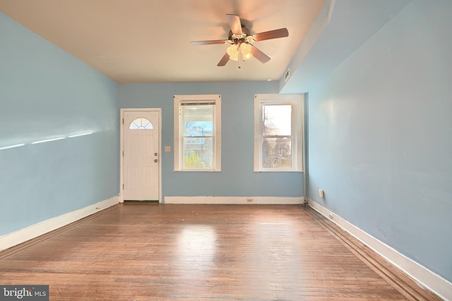 entryway with ceiling fan and hardwood / wood-style floors