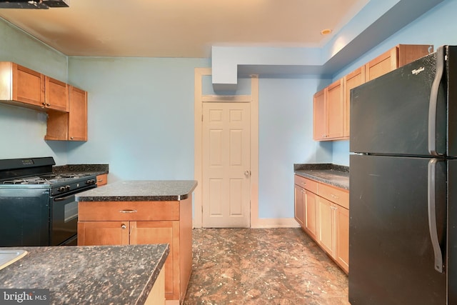 kitchen featuring a center island and black appliances