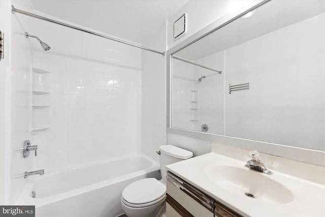 full bathroom with vanity, toilet, and tiled shower / bath