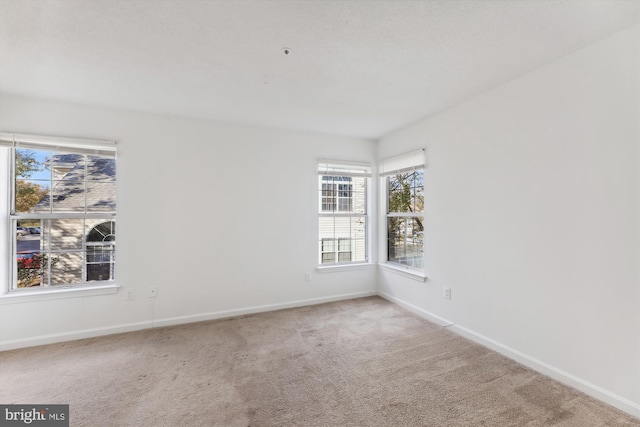 view of carpeted spare room