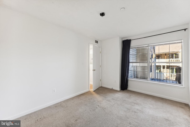 view of carpeted spare room