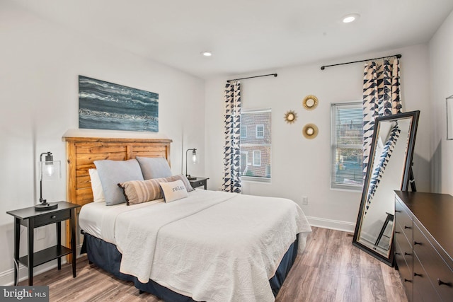 bedroom featuring hardwood / wood-style floors