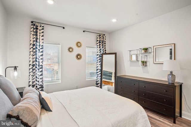 bedroom with light wood-type flooring