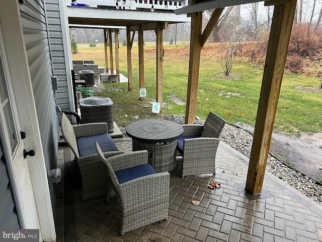 view of patio / terrace with central AC unit