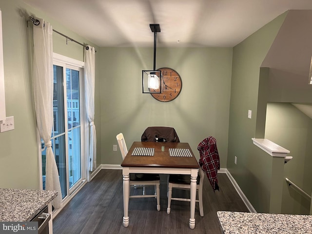 unfurnished dining area with dark hardwood / wood-style floors