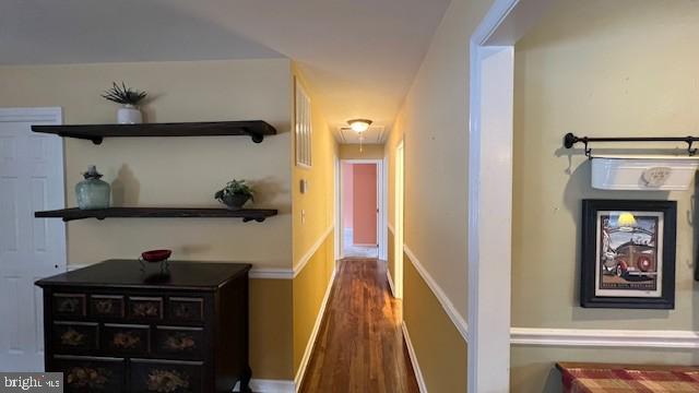 hall featuring dark hardwood / wood-style flooring