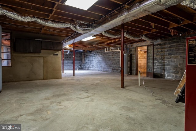 basement featuring water heater