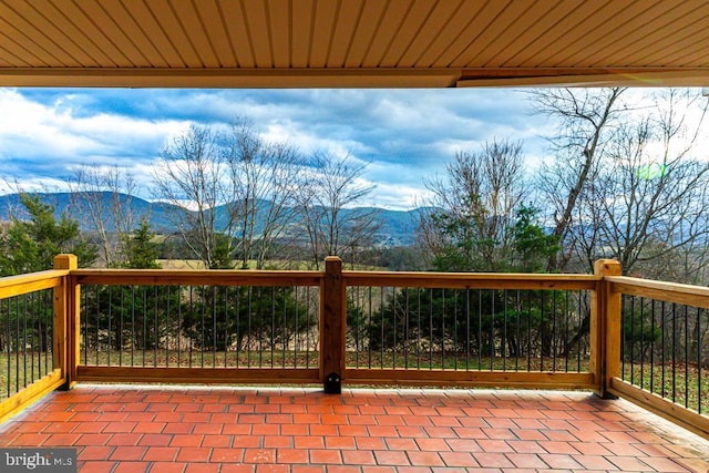 view of patio / terrace with a mountain view