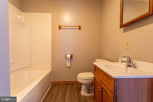 2520 Ridge Rd, Upper Tract, WV 26866 - bathroom featuring wood finished floors, vanity, and tub / shower combination