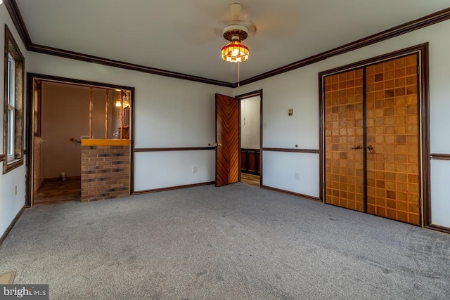 unfurnished bedroom featuring carpet and ornamental molding