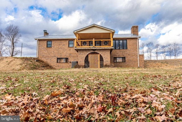2520 Ridge Rd, Upper Tract, WV 26866 - ranch-style house with a chimney, a balcony, brick siding, and a metal roof