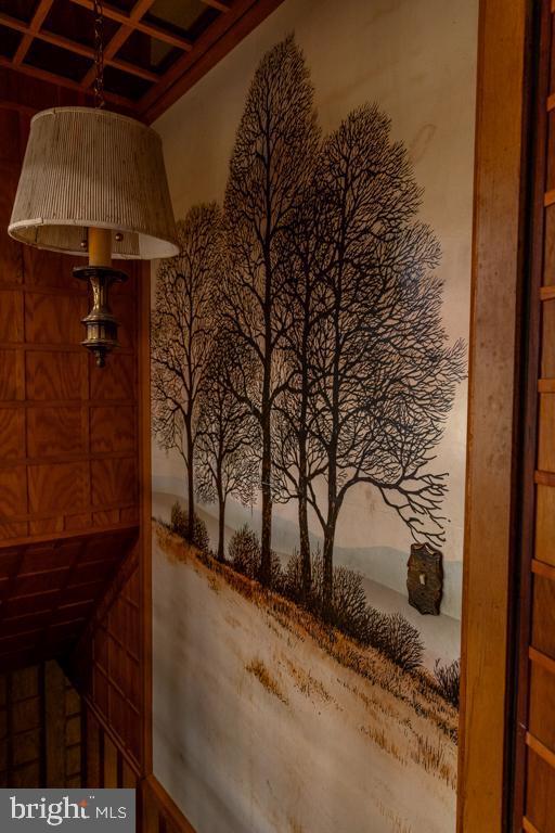 interior space featuring coffered ceiling