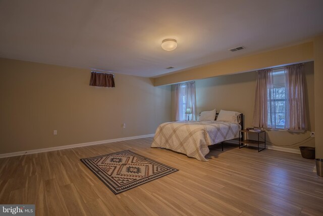 bedroom featuring wood-type flooring