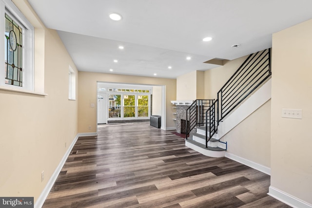 interior space with dark hardwood / wood-style flooring