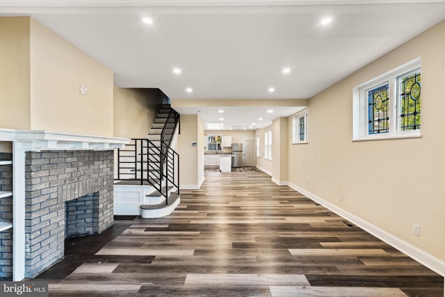 interior space with dark hardwood / wood-style floors