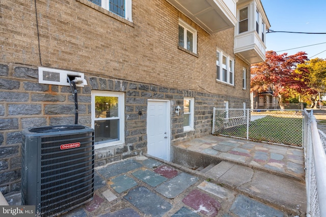 property entrance featuring central AC