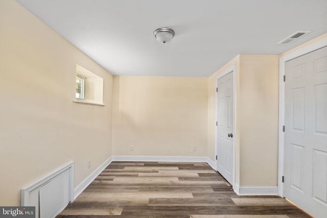 interior space with hardwood / wood-style floors