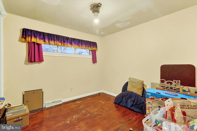 bedroom featuring wood-type flooring