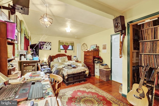 bedroom featuring dark hardwood / wood-style floors