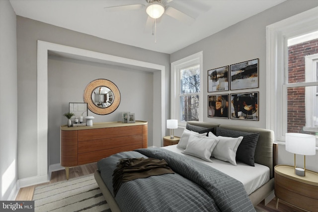 bedroom featuring ceiling fan and light wood-type flooring