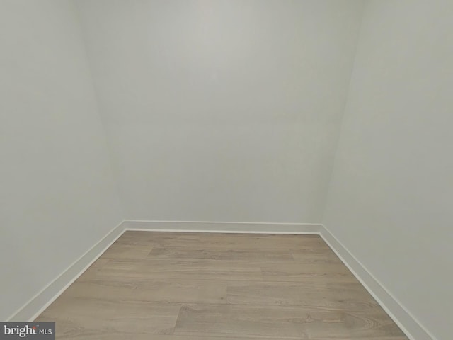 unfurnished room featuring light hardwood / wood-style floors