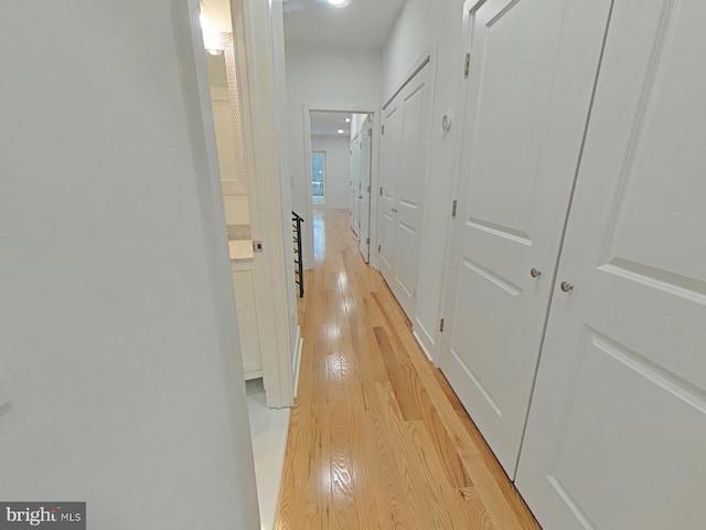 corridor featuring light wood-type flooring