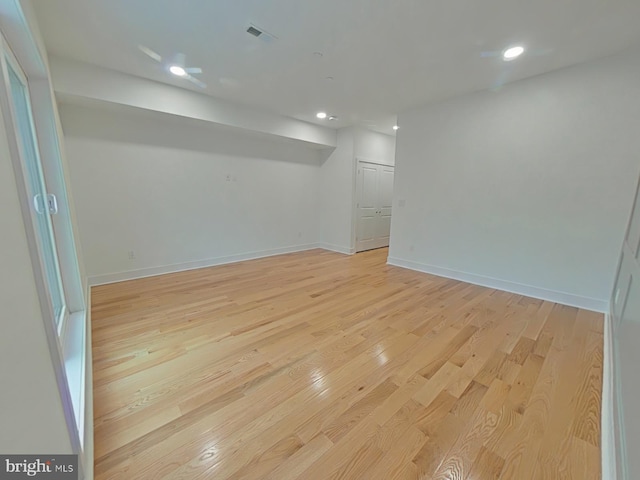 basement with light wood-type flooring