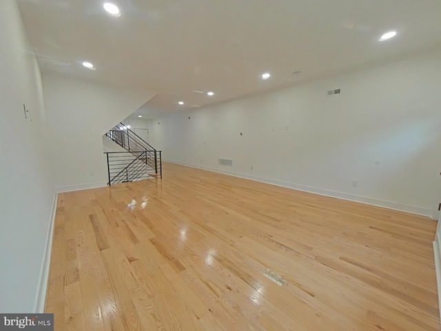 unfurnished living room featuring light wood-type flooring