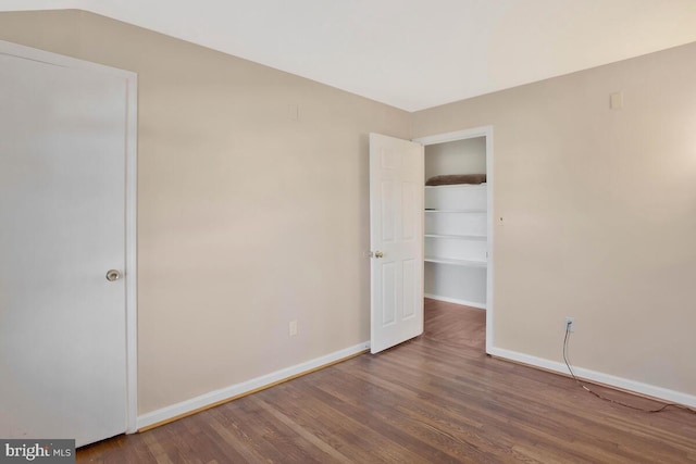 unfurnished bedroom featuring wood-type flooring