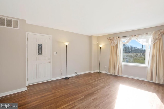 interior space with hardwood / wood-style flooring