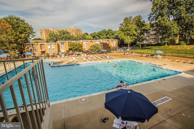 view of swimming pool featuring a patio