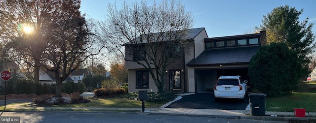 view of front of property featuring a garage