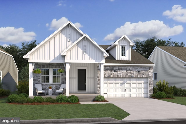 modern farmhouse style home with a front yard and a garage