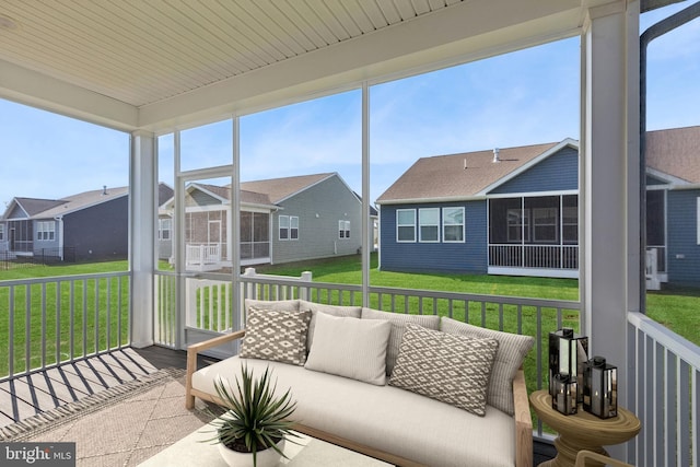 sunroom featuring wooden ceiling