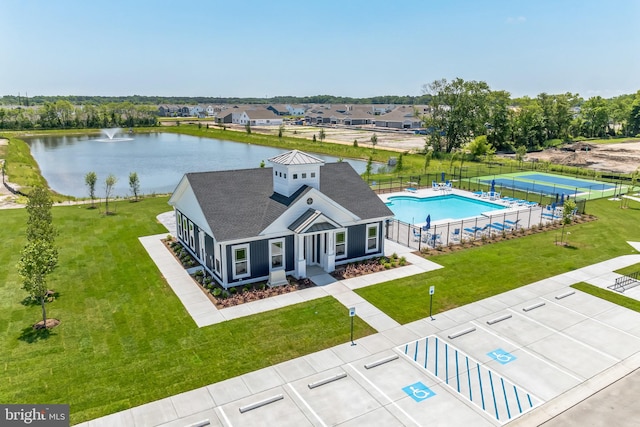 drone / aerial view featuring a water view