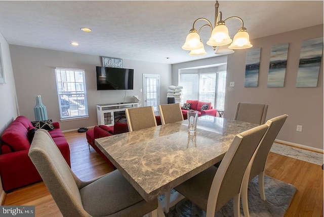 5310 Kelmscot Rd, Rosedale, MD 21237 - dining space featuring light wood-style floors, baseboards, recessed lighting, and a chandelier