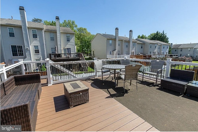 5310 Kelmscot Rd, Rosedale, MD 21237 - wooden terrace featuring a residential view and outdoor dining space