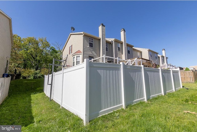 5310 Kelmscot Rd, Rosedale, MD 21237 - exterior space featuring a lawn, fence, and a chimney