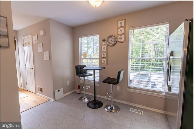 5310 Kelmscot Rd, Rosedale, MD 21237 - dining space with visible vents, baseboards, and tile patterned floors