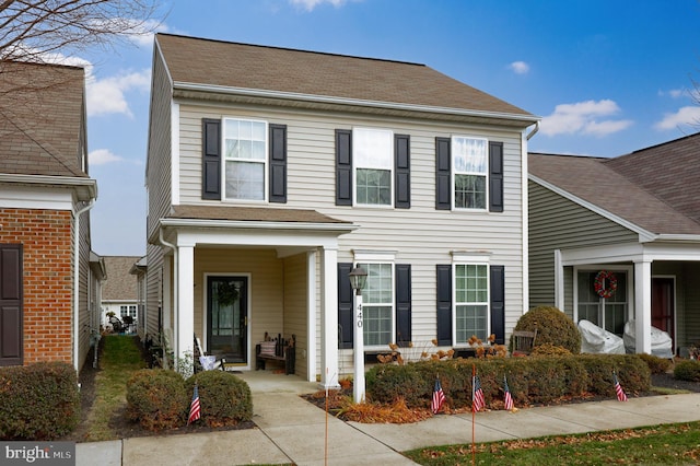 view of front of house featuring a shingled roof