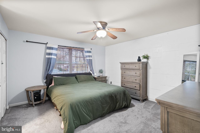 bedroom with light colored carpet and ceiling fan